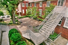 Staircase leading into the courtyard at The Lofts San Marco