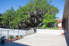 Second floor patio overlooking courtyard at The Lofts San Marco