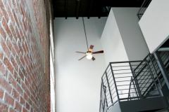 Old brick and new metal staircase at The Lofts San Marco